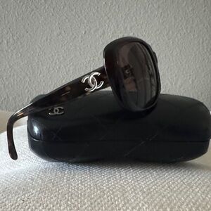 CHANEL Black Tortoiseshell Oval Sunglasses with Silver CC Accents